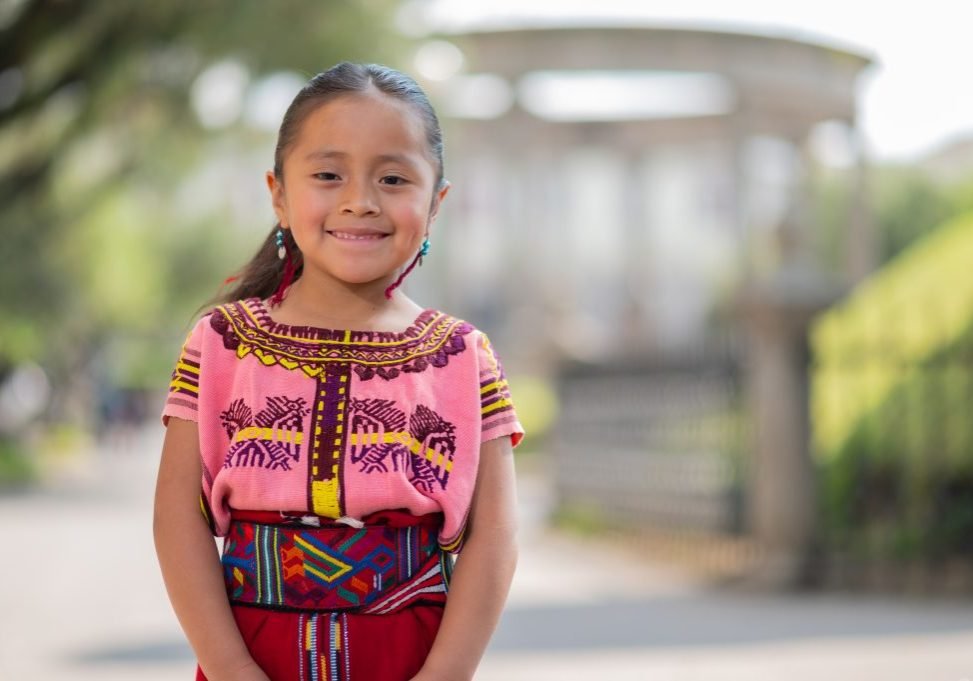Portrait,Of,A,Beautiful,Indigenous,Girl,With,A,Colorful,Dress
